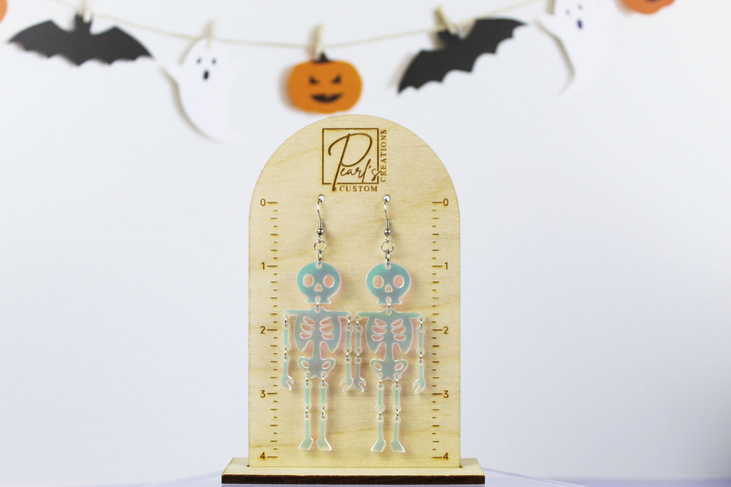 Frosted Iridescent Dancing Skeleton Dangle Earrings