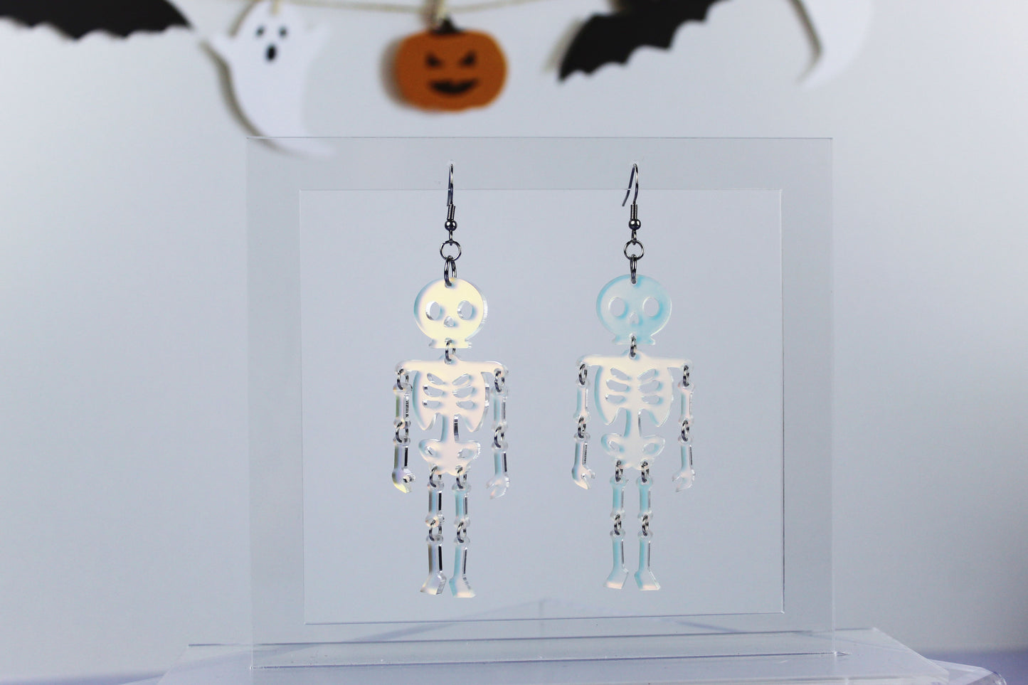 Frosted Iridescent Dancing Skeleton Dangle Earrings