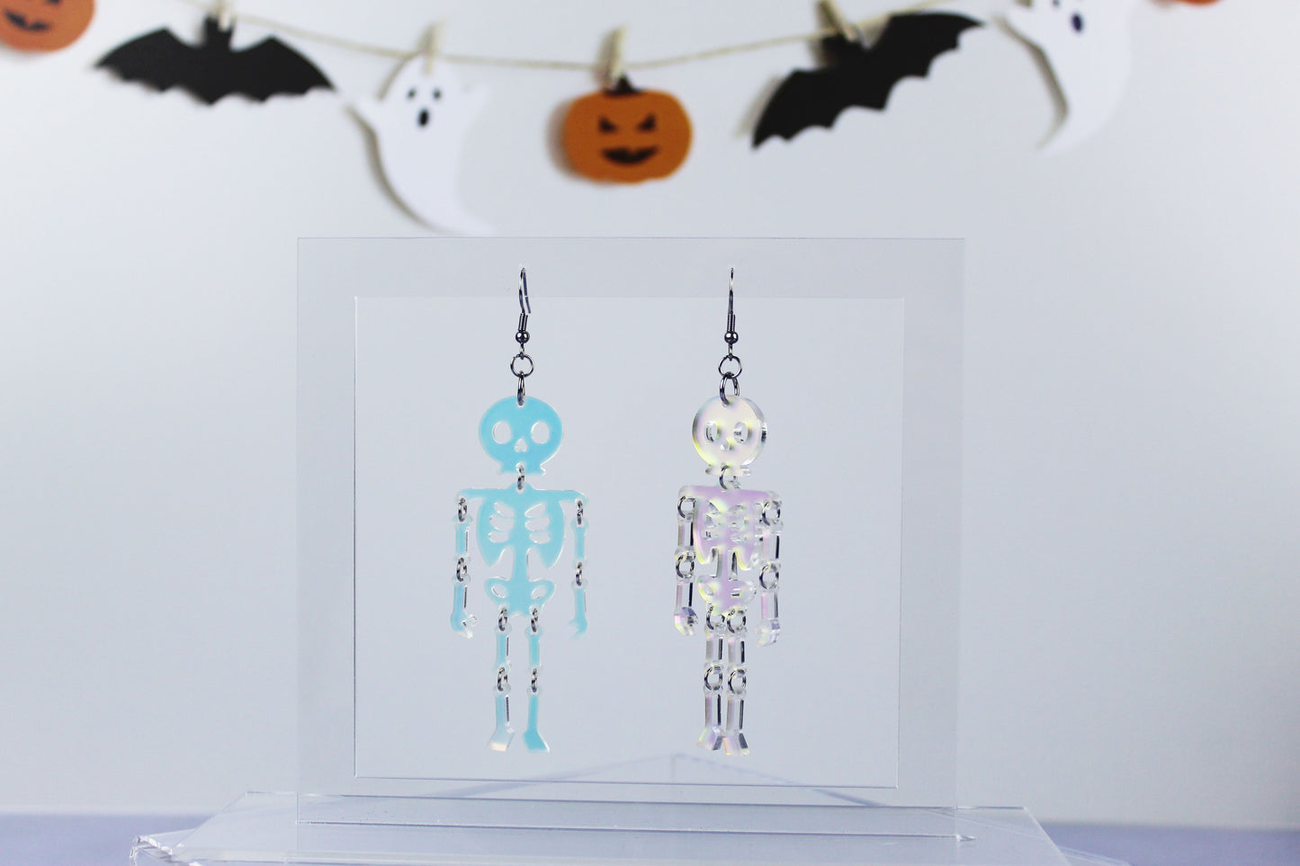 Frosted Iridescent Dancing Skeleton Dangle Earrings